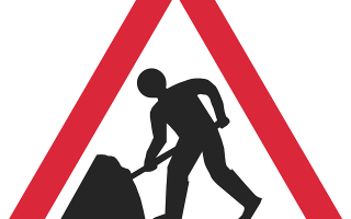 Picture of road sign indicating roadworks ahead.
